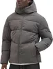 A man wearing a gray puffer jacket. Produktbild-Vorschau