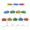 A pyramid arrangement of small glass jars with checkered lids. Voir les images du produit