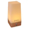 A product shot of a white LED night light with a brown base. Anteprima dell’immagine prodotto
