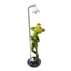 A figurine of a frog showering. Produktbild-Vorschau
