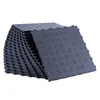 A stack of interlocking garage floor tiles. Voir les images du produit