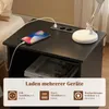 A dark-colored nightstand with a built-in charging station, showing a smartphone being charged. Náhled obrázku produktu