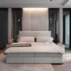 A modern bedroom with a large bed as the focal point. Produktbild-Vorschau