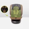 A 360-degree rotating car seat with a green overlay highlighting the harness system. Produktbild-Vorschau