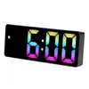 A digital alarm clock displaying the time 6:00 with a rainbow-colored display. Náhled obrázku produktu
