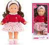 A doll is shown standing and in its packaging. Produktbild-Vorschau