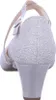 A back view of a single silver high-heeled shoe. Voir les images du produit