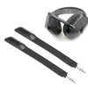Two black microphone attachments and a black gaming headset are shown against a white background. Voir les images du produit