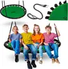 Four children are sitting on a green nest swing. The swing and its accessories are also shown separately. Podgląd zdjęcia produktu