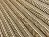 A close-up, angled view of textured wall panels with a wood grain pattern. Náhled obrázku produktu
