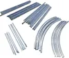 Various metal poles and curved pieces, likely components for a greenhouse or tunnel structure, laid out on a white background. Voir les images du produit