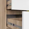 Close-up view of a wooden cabinet with drawers and drawer slides. Podgląd zdjęcia produktu