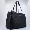 A black quilted shopper bag with gold Valentino logo. Produktbild-Vorschau