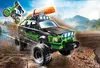 A toy off-road truck with a kayak on top, kicking up mud, with a toy motocross rider in the air. Anteprima dell’immagine prodotto
