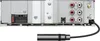 The back panel of a car stereo receiver with various input/output ports and a connected cable. Anteprima dell’immagine prodotto