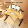 A modern height-adjustable desk with a computer, keyboard, and tablet set up, showcasing a home office environment. Anteprima dell’immagine prodotto