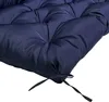 A close-up view of a dark blue tufted cushion with ties. Produktbild-Vorschau