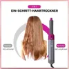 Grauer und rosafarbener 5-in-1-Ein-Schritt-Föhn neben den Haaren einer Frau, zeigt vorher kraus und stumpf und nachher glatt und glänzend Podgląd zdjęcia produktu