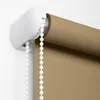 A close-up view of a roller blind mechanism and fabric. Produktbild-Vorschau