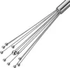 A close-up shot of a metal whisk with small balls on the ends of the wires. Produktbild-Vorschau
