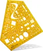 A yellow drafting template with various geometric shapes, letters, and numbers cut out. Náhľad obrázku produktu