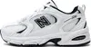 A side view of a white and black New Balance sneaker. Podgląd zdjęcia produktu