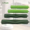 Four vacuum cleaner roller brushes are displayed in front of a blurred background of a bedroom. Podgląd zdjęcia produktu