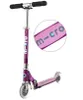 A purple Micro Scooter Sprite Special Edition is shown against a white background. A close-up inset shows the 'micro' logo on a pink strap. Produktbild-Vorschau