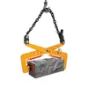 A yellow stone clamp is shown lifting a gray stone block against a white background. Voir les images du produit