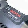 A close-up view of a Bosch professional power tool charger. Voir les images du produit