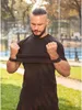A man is exercising outdoors with a resistance band. Produktbild-Vorschau