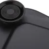 A close-up view of a black vibration plate with a textured circular component. Produktbild-Vorschau