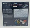 The back of a Ravensburger Mystery Advent Calendar box for kids, themed around space exploration. It shows text descriptions, instructions, and small illustrations of items included in the calendar. Produktbild-Vorschau