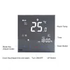 A digital thermostat with a large LCD display showing temperature and time. Náhled obrázku produktu