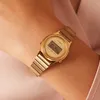 A close-up shot of a gold Casio digital watch on a person's wrist. Produktbild-Vorschau