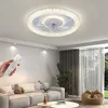 A modern living room with a fan-light fixture on the ceiling. Produktbild-Vorschau
