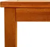 A close-up view of the corner of a wooden table. Náhľad obrázku produktu