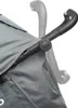 A close-up view of a stroller handle and canopy. Náhľad obrázku produktu