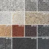 A collage of different colored textured plaster samples, each labeled with a code. Produktbild-Vorschau