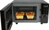 A microwave oven with its door open, showing two glass dishes of food inside. Produktbild-Vorschau