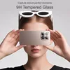 A woman holds a smartphone in front of her face, obscuring her eyes, with white sunglasses perched on her head. The phone's rear camera module is visible. Produktbild-Vorschau