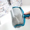 A paint roller is being rinsed under a faucet in a sink. Voir les images du produit