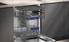 An open dishwasher with two racks visible, showing the interior of the appliance. Produktbild-Vorschau
