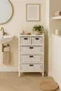A bathroom with a sink, a rattan drawer unit, and a mirror. Produktbild-Vorschau