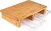 A bamboo cutting board with two clear plastic collection trays underneath. Produktbild-Vorschau