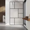 A modern bathroom with a walk-in shower, washing machine, and wooden cabinets. Podgląd zdjęcia produktu