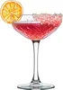 A single coupe glass filled with a pink cocktail, garnished with a dried orange slice and a rim of pink sugar. Náhled obrázku produktu