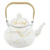 A white teapot with gold marbling and a gold handle, isolated on a white background. Podgląd zdjęcia produktu
