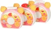 Three toy birthday cakes are lined up in front of a white background. Podgląd zdjęcia produktu