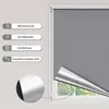 A grey roller blind is shown partially unrolled over a window, with icons and text describing its features on the left side. Produktbild-Vorschau